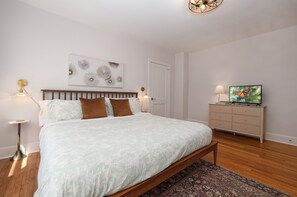 King bed in bedroom.