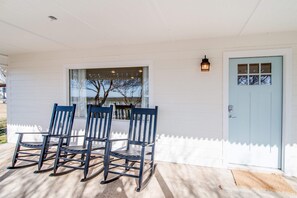 Nothing says “welcome” like a pair of rocking chairs on the front porch. 