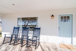 Nothing says “welcome” like a pair of rocking chairs on the front porch.