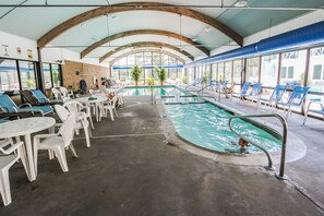 Dive into fun at the indoor pool, where families can enjoy leisure time in a spacious, well-lit environment with comfortable seating.
