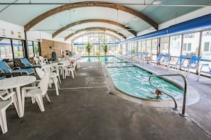 Dive into fun at the indoor pool, where families can enjoy leisure time in a spacious, well-lit environment with comfortable seating.