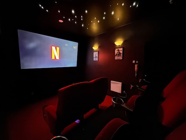 Cinema with 97inch TV, stars ceiling lights, cinema seats and surround sound system! Netflix, Sky Sports and Sky Movies included.