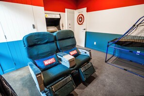 Air NZ seats in the separate Games Room with a PS5 and Arcade