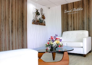 Experience beachfront relaxation in this charming 2-bedroom efficiency condo at Sand Pebble, featuring cozy sleeping arrangements, a convenient kitchenette, and just a short stroll to John's Pass for dining and shopping.