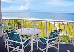 Enjoy breathtaking views and the refreshing ocean breeze from your private balcony, perfect for relaxing after a day at the beach.