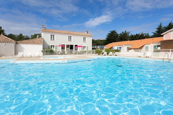 Lounge by the pool in the sunshine from June to September.