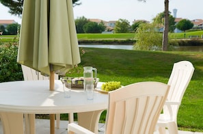 Sit out on the furnished terrace that opens onto your private garden!