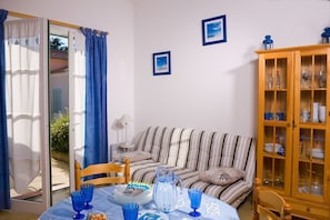 Sink into the cozy sofa after a day exploring the area.