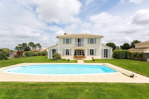Dive into your outdoor pool during the summertime (pool heating is available for a charge).