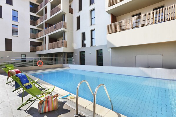 In the summer, dive into the gorgeous outdoor pool outside.
