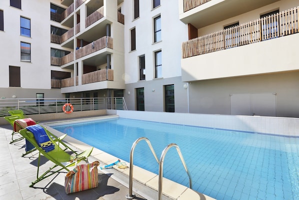 In the summer, dive into the gorgeous outdoor pool outside.