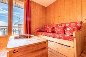 Kick back your feet and relax in the cozy living area.