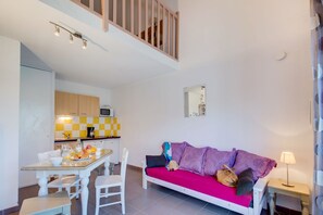 Sit back and relax on the comfortable sofa.