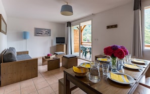 Enjoy meals together at the dining room table.