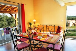 Share meals at the dining table, or out on the terrace.