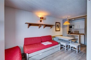 Sink into the cozy sofa after a day exploring the area.