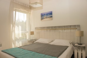 The master bedroom features a Double bed.