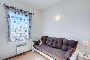 Sink into the comfy sofa after a day exploring the area.