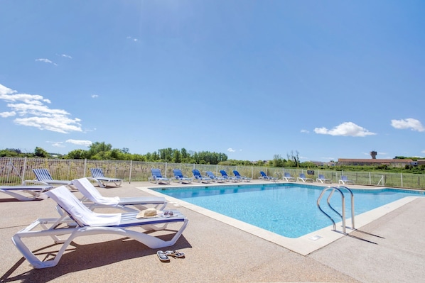 Take in gorgeous views while lounging around the on-site outdoor pool.