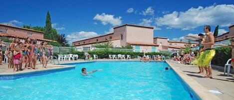 Spend time with family and friends in the outdoor pool during the summer.