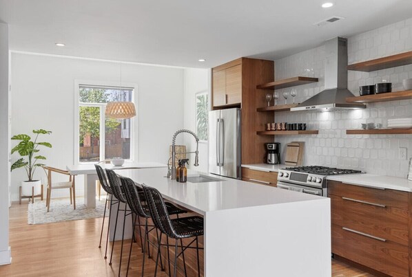 Fully-stocked, modern kitchen suitable for any chef! We provide all the essential supplies and utensils you'll need for your morning coffee routine and any other cooking adventures.