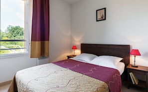The cozy bedroom features a Double bed.
