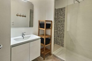 Freshen up in the bathroom after a day of adventure.