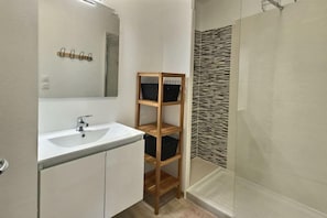 Freshen up in the bathroom after a day of adventure.