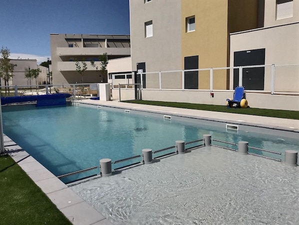Take a dip in the lovely outdoor pool.
