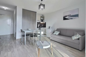 Sink into the cozy sofa after a day exploring the area.