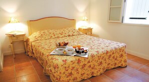 There are 3 bedrooms - two feature 2 single beds and one contains a double bed.