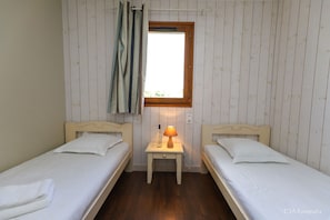 Relax on the comfy bed after a day outside.