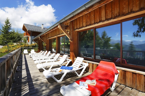 In the summer, lounge outside and work on your tan.