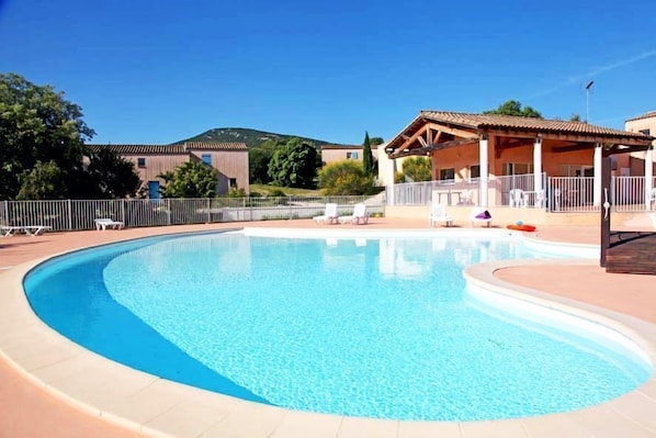 Take in gorgeous views while lounging around the on-site outdoor pool.
