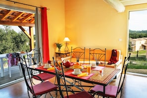 Settle into the dining area and enjoy a nice meal.