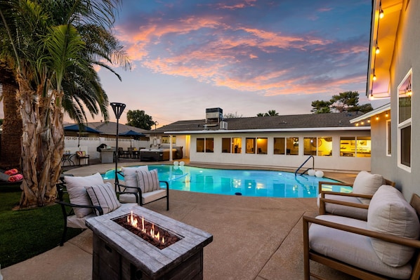 Evenings are better by the fire — cozy up by the firepit or take a dip in the pool as the sun sets on your private Scottsdale escape.