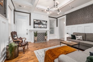 Enter The Southern Gentleman thru this stunning Family Parlor built for relaxation and comfort. No expense was spared for our guest to enjoy their stay!