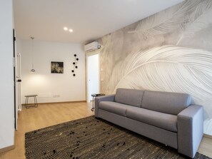 Furniture, Interior Design, Flooring, Floor, Wall, Wood Flooring, Wood, Couch, Ceiling, Living Room