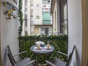 Apartment, Balcony, Chair, Houseplant, Daylighting
