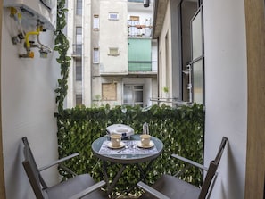 Apartment, Balcony, Chair, Houseplant, Daylighting