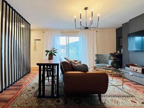 LIVING ROOM | FIRST FLOOR: You'll be charmed by the vintage touches throughout the room.