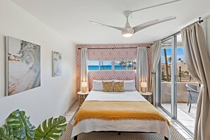 Drift off to the sound of waves, peaceful dreams start in this ocean-hued haven.