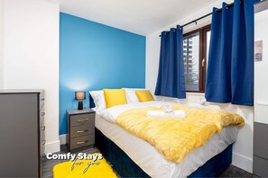 Upstairs Bedroom with a Double bed and 2 separate single duvets