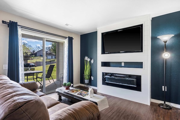 Stream your favorites on the smart TV in the sophisticated living room