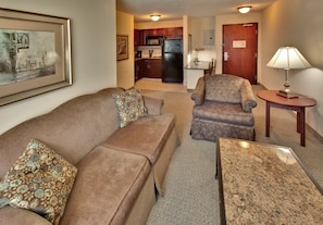 Snuggle up with a cup of coffee or tea on the comfortable sofa.