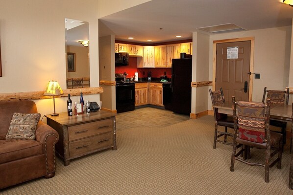Relax in the charming and beautiful open-concept living space after a long day out exploring the slopes