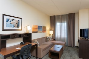 Sink into the cozy sofa after a day exploring the area.