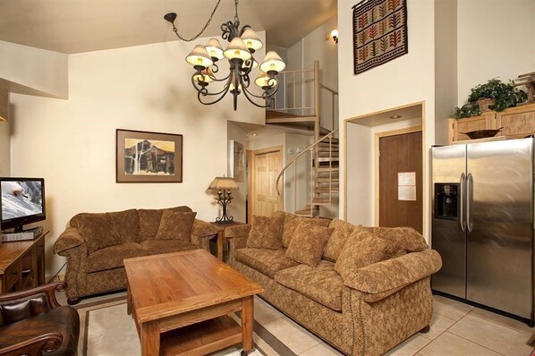 Kick back your feet and relax in the cozy living area.