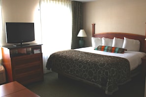 Drift off to sleep in the plush King bed in the bedroom