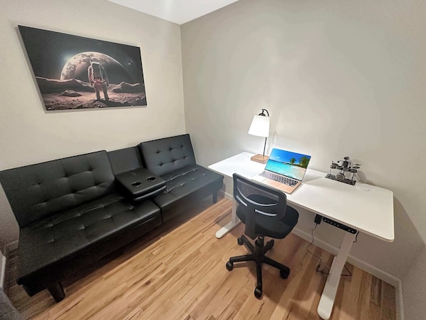 stand up desk and reading area. Flex space.